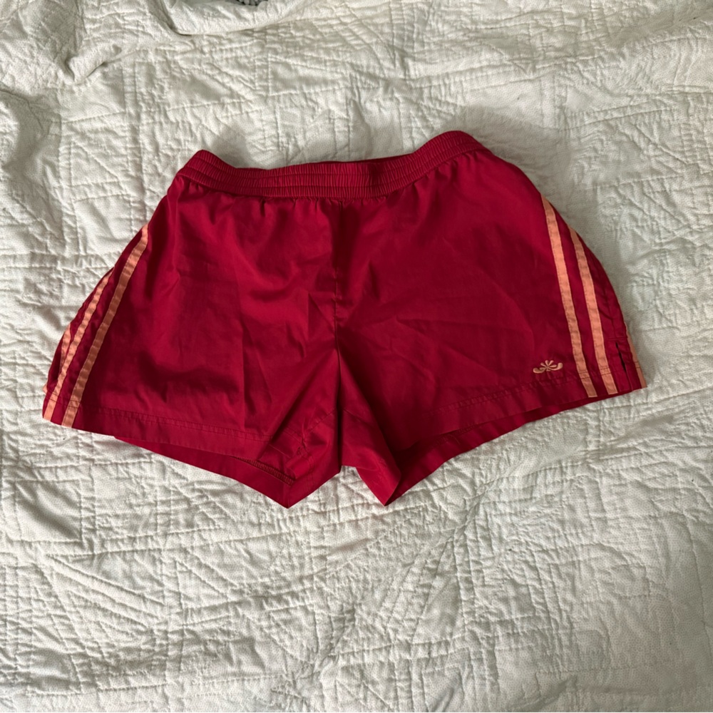 Red Athletic Shorts with Gold Stripes
